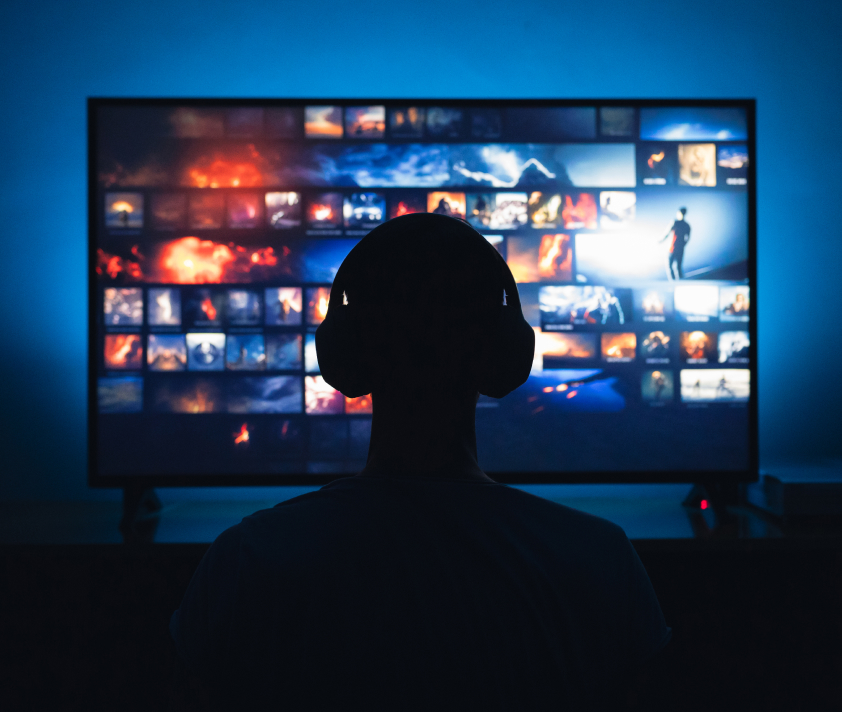 Person-sitting-in-front-of-the-tv